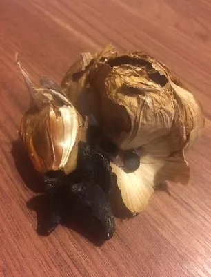 TÊTE D'AIL NOIR ALS'AIL NOIR LA PIÈCE
